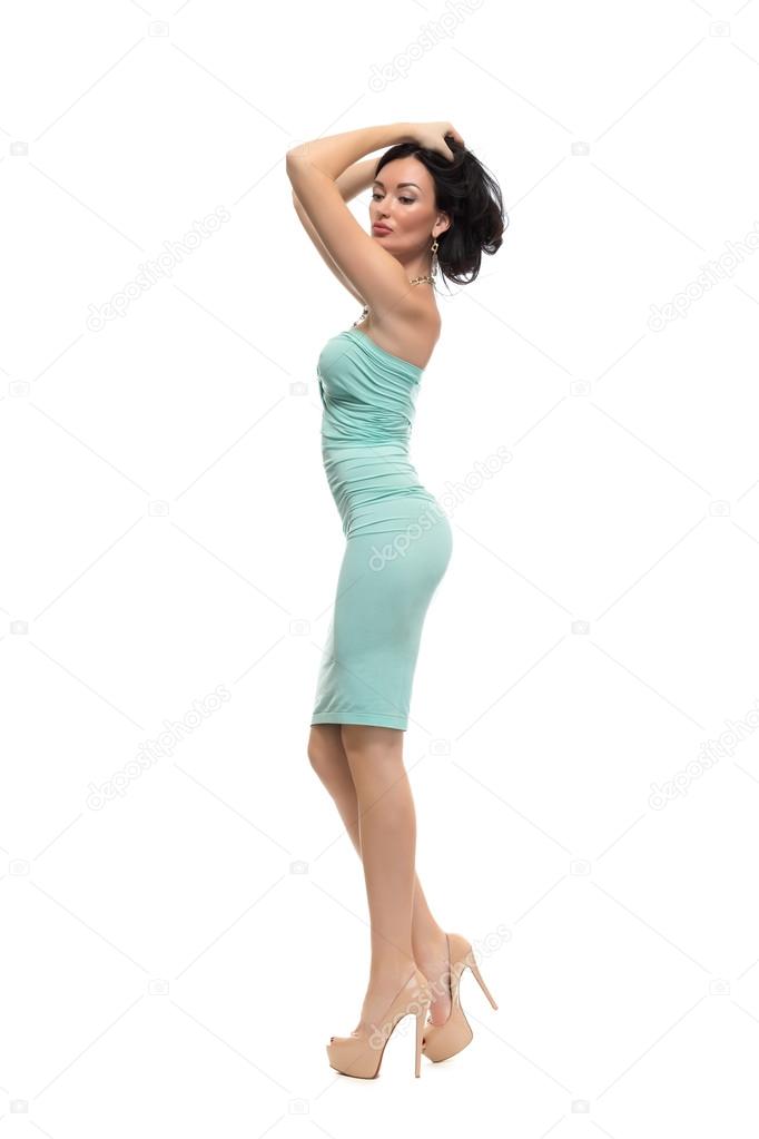 alluring sexy woman in evening dress posing, isolated on white