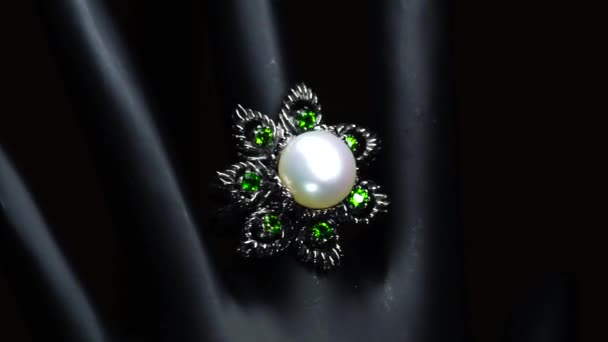 Silver ring with natural gemstones on the black hand — Stock Video