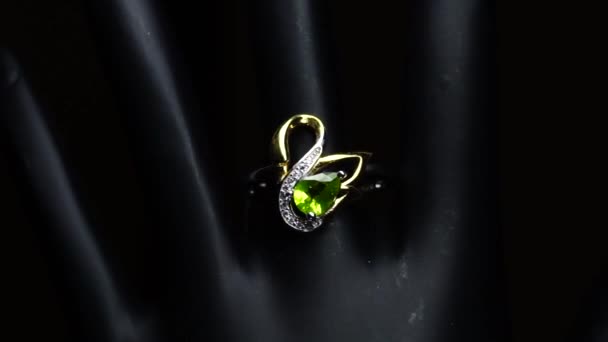 Silver ring with natural gemstones on the black hand — Stock Video