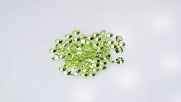 Natural Peridot Gemstone White Background Turning Table — Stock Video