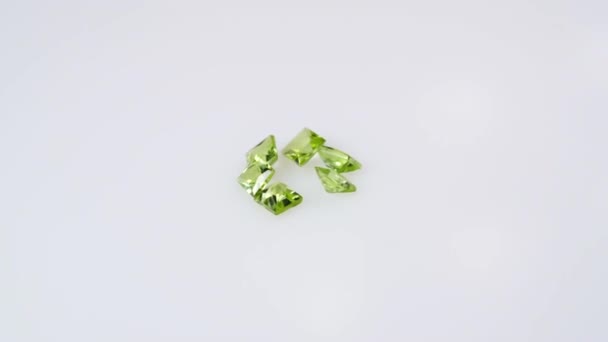 Natural Peridot Gemstone White Background Turning Table — Stock Video