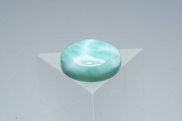 Natural larimar stone on white background