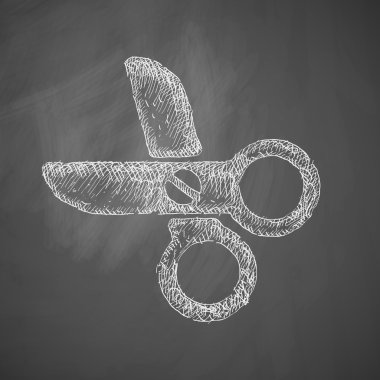 scissors icon on chalkboard