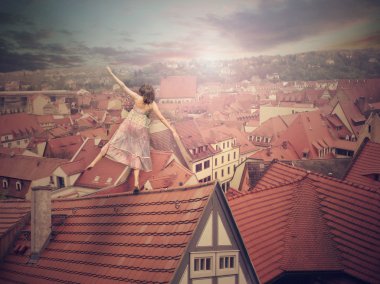 Genç kız çatının üstüne. Photomanipulation. Konsept dijital