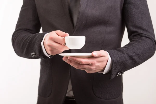 Coffee cup in hand — Stock Photo, Image