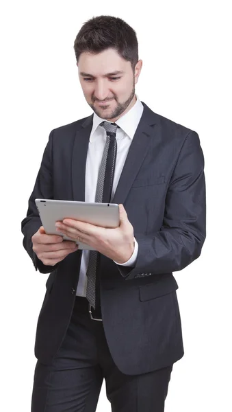 Задоволений бізнесмен тримає планшет — стокове фото