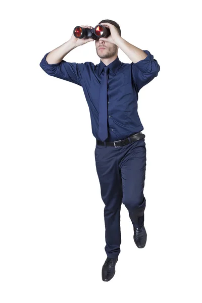 Hombre de negocios con prismáticos en una escalera — Foto de Stock