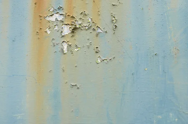 Weathered blue paint on rust — Stock Photo, Image
