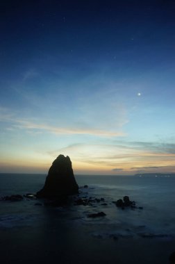 Papuma sahilinde günbatımının güzelliği