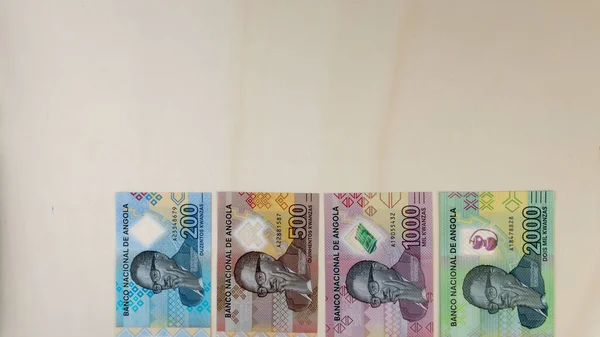 Overhead shot of Angolan Kwanzas banknotes new serie launched at the end of 2020 — 스톡 사진