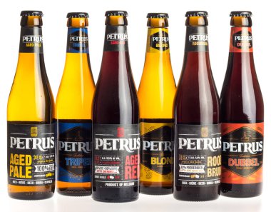 Bottles of belgian Petrus craft beers isolated on a white background clipart