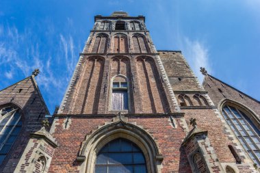 Tower of the historic Sint Jan church in Gouda, Netherlands clipart