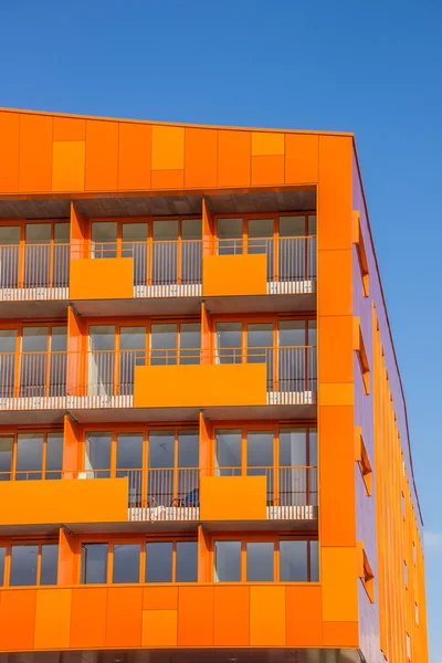 Balconies at a modern orange appartment building in Groningen — Stock Photo, Image