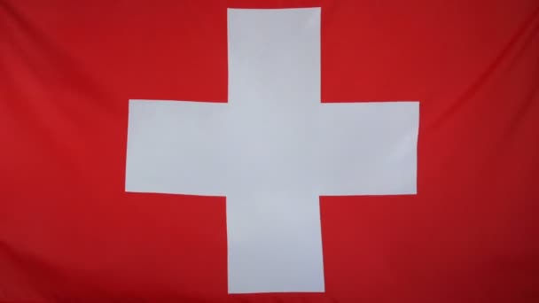 Schweizer Flagge aus echtem Stoff hautnah — Stockvideo