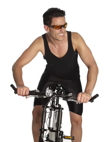 Young man on a bike — Stock Photo, Image