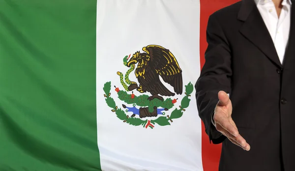 Mano abierta y bandera de México en el fondo — Foto de Stock