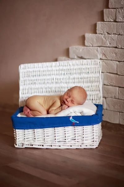 Sleeper newborn baby in white box