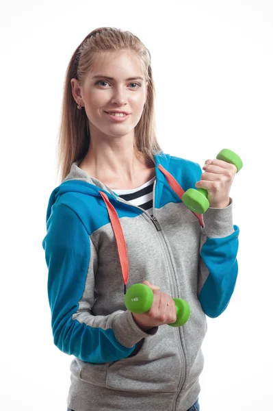 The girl with dumbbells — Stock Photo, Image