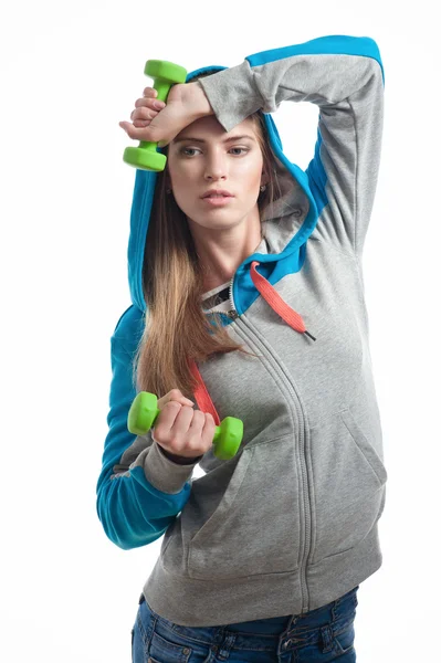 The girl with dumbbells — Stock Photo, Image