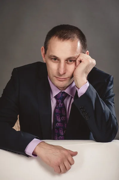 Thoughtful man in suit — Stock Photo, Image