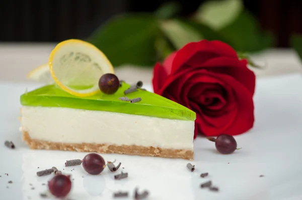 Cheesecake with green jelly — Stock Photo, Image