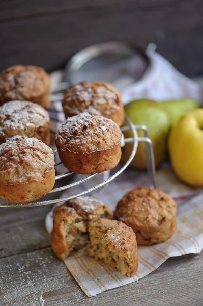 Freshly baked muffins with pear and apple — Stock Photo, Image