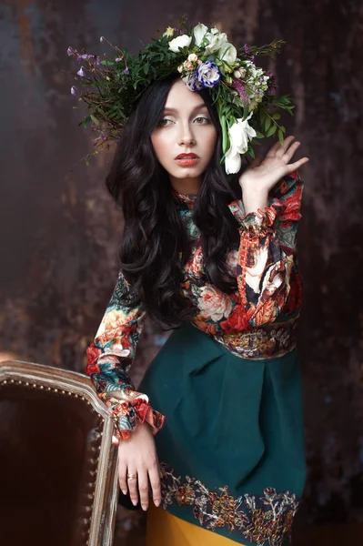 Beautiful Woman with Curly Hair, Makeup and Flowers Wreath — Stock Photo, Image