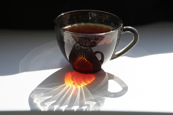 A cup of tea on the windowsill — Stock Photo, Image