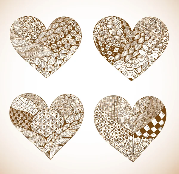 Ornated zentangle style hearts — Stock vektor