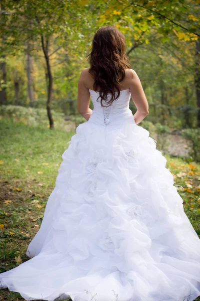 Brunette Girl Stands Beauty White Long Dress Deep Cut Her — Stock Photo, Image