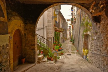 A narrow street in Pacentro, an old town in the Abruzzo region, Italy. clipart
