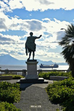 Naples, Italy, December 2020. Statue dedicated to the Roman emperor Caesar Augustus on the city's waterfront.