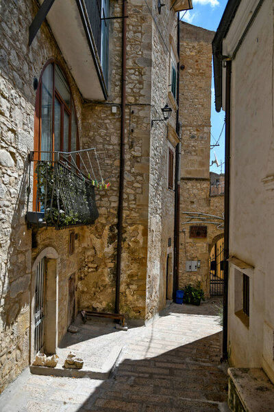 Sant'Agata di Puglia, Italy, 07/03/2021. A narrow street among the old houses of a medieval village in southern Italy.