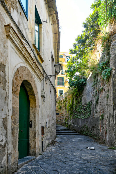 A street in Salerno, in historic city center with buildings from the medieval era.