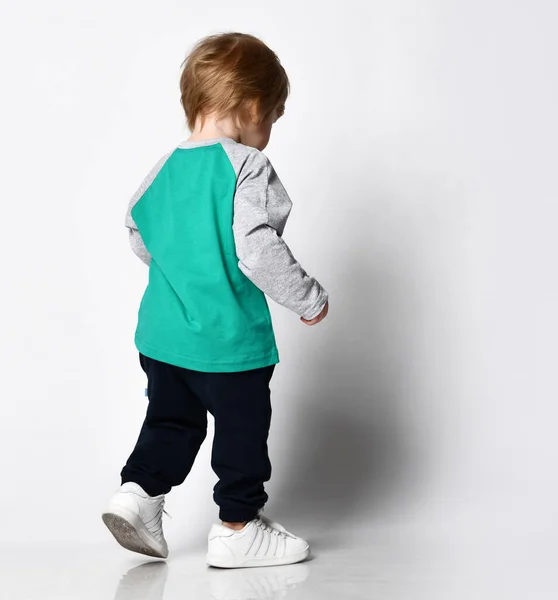 Little preschool toddler boy showing growth up gesture portrait — Stock Photo, Image