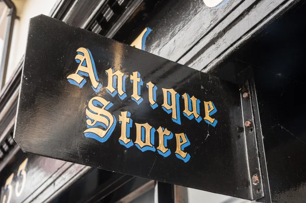 Antiques shop sign — Stock Photo, Image