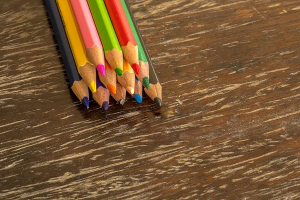 Sort crayons flooring surfaces, bright colors, red, yellow, blac — Stock Photo, Image