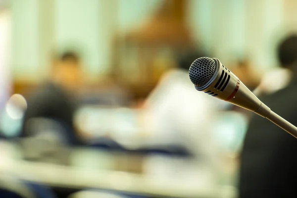 Microphone against the background of convention center — Stock Image Microphone against the background of convention center Stock Picture