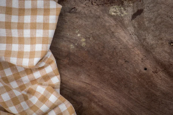 Mantel textil sobre fondo de madera — Foto de Stock