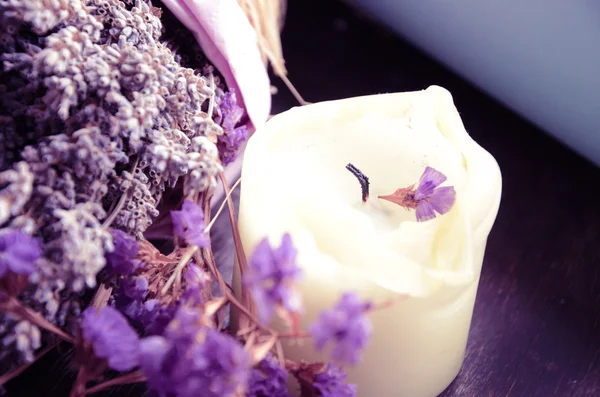 Lavender flower and a candle — Stock Photo, Image
