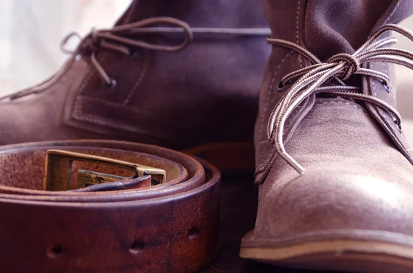 Laarzen en een riem — Stockfoto