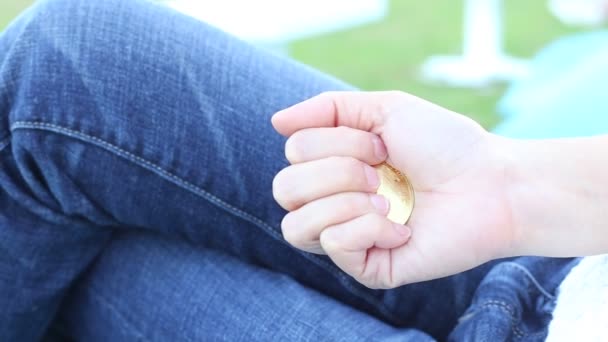 Businesswoman holding bitcoin .Golden bitcoin coins in women's hands. Virtual currency. Crypto currency. New virtual money. Opened wallet. — Stock Video