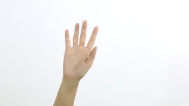 Menutup tangan wanita menunjukkan melambaikan bye di latar belakang putih. — Stok Video