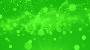 Yumuşak yeşil bokeh hareket grafikleri ve yüzen parlak parçacıklar