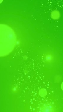 Parlak toz efektli lüks yeşil bokeh parıltısı