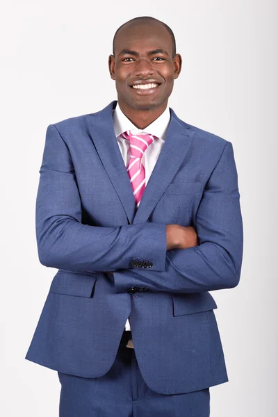 Negro hombre de negocios vistiendo traje y corbata sonriendo —  Fotos de Stock