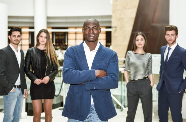 Cheerful young African man in formalwear keeping arms crossed — Stock Photo, Image