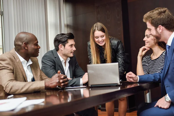 Group of multiethnic busy people working in an office — Stock Photo, Image