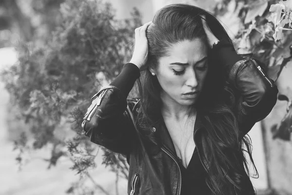 Depressed woman deep in thought outdoors — Stock Photo, Image