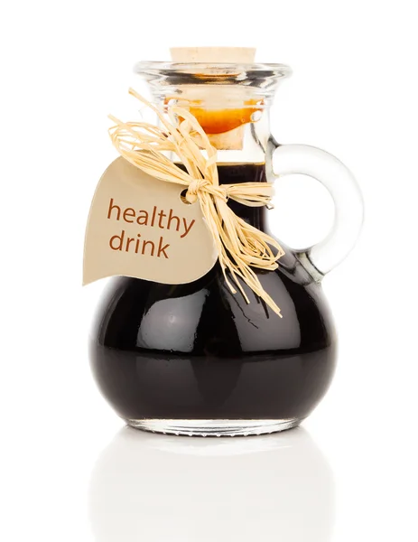 Maple syrup in glass bottle or herbal syrup, ardent drink, mixtu — Stock Photo, Image